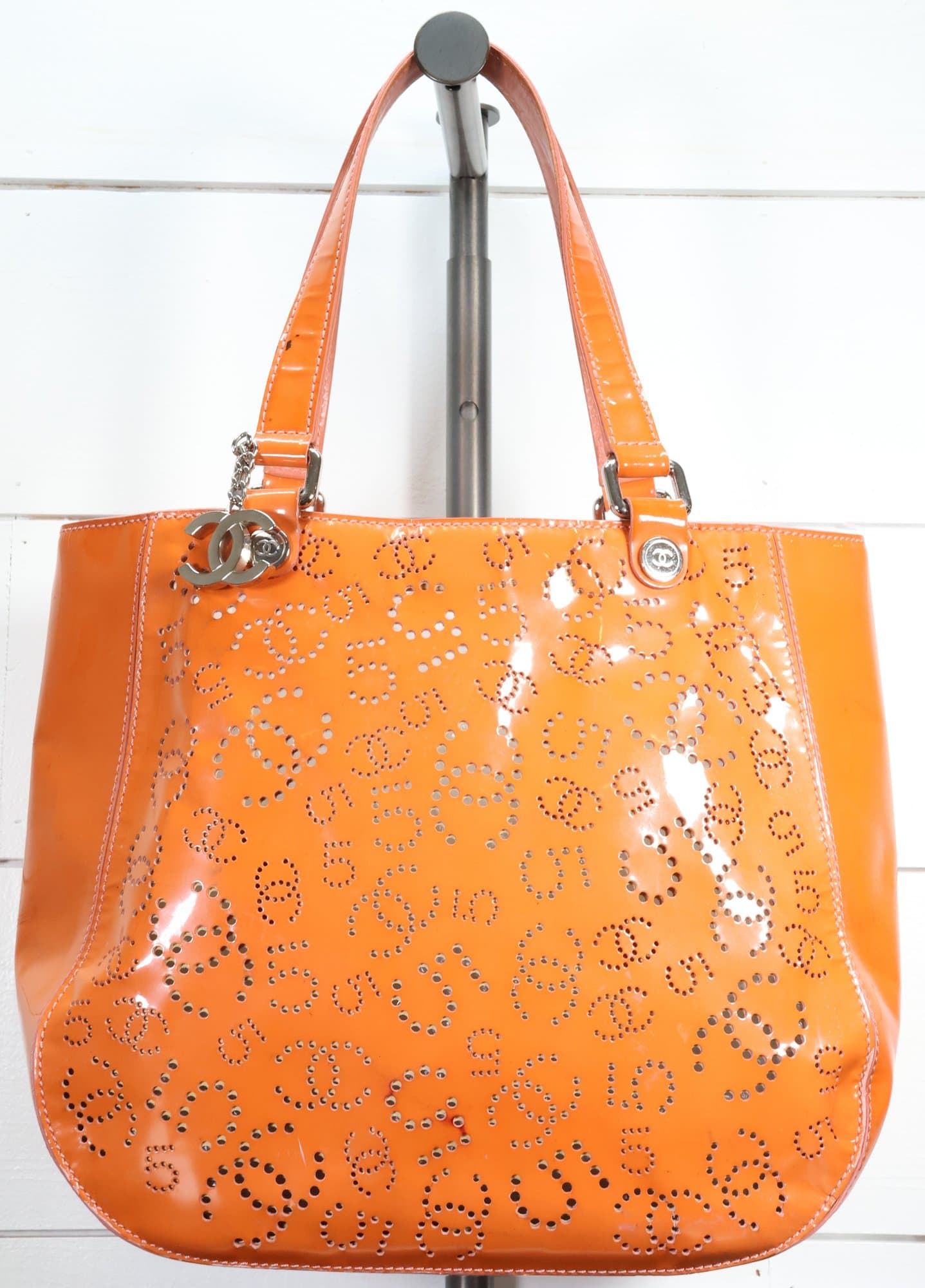 Chanel Orange Patent Leather Punching Tote Bag Perforated Logo Design Silver Hardware Charm Detail