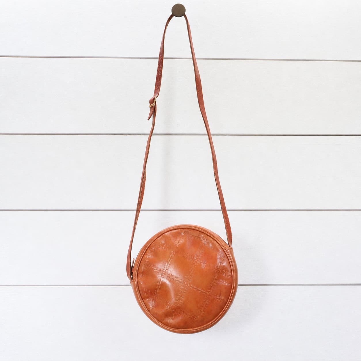 Yves Saint Laurent Embossed Logo Leather Round Crossbody Shoulder Bag Purse Tan