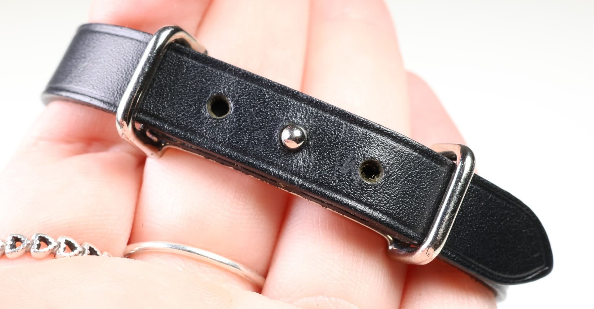 Hermès Black Leather Strap Bracelet Silver Tone Hardware Stud Closure Wristband