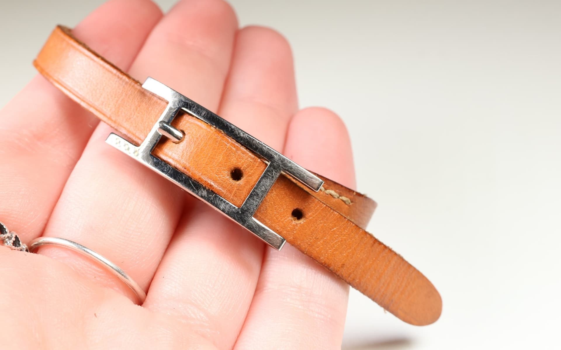 Hermès Tan Leather Strap Bracelet Silver Tone H Buckle Adjustable Pin Buckle Bracelet